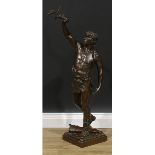 2707 - Eugène Marioton (1857-1933), French, a large brown patinated bronze, Vainqueur, an archer holding al... 