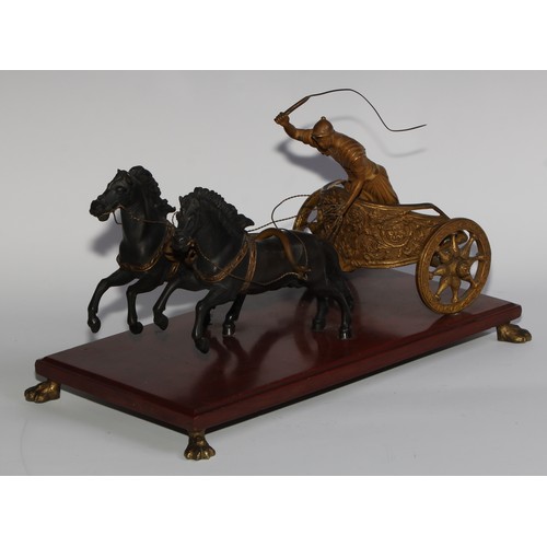 2712 - French School (19th century), a Grand Tour gilt and dark patinated bronze group, of an Ancient Greek... 