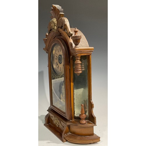 2410 - An early 20th century American gingerbread form mantel clock, by the Ansonia Clock Co., New York, Un... 