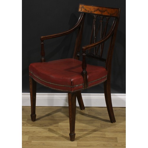 1981 - A pair of Sheraton Revival mahogany and marquetry elbow chairs, each cresting rail inlaid with an ur... 