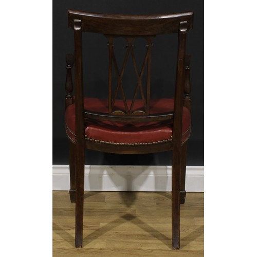 1981 - A pair of Sheraton Revival mahogany and marquetry elbow chairs, each cresting rail inlaid with an ur... 