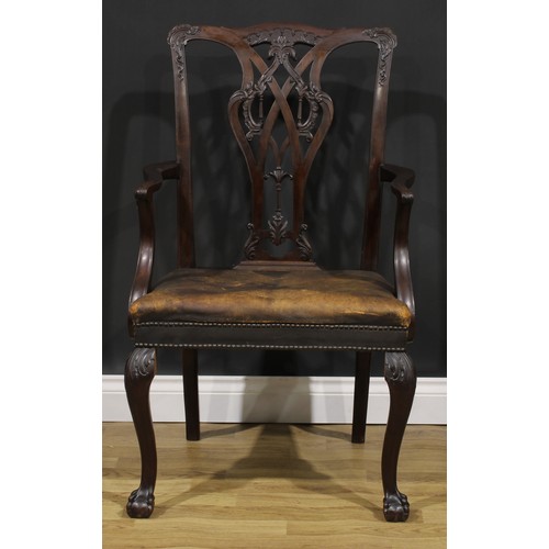 1866 - A pair of early 20th century Chippendale Revival mahogany open armchairs, by Sopwith & Co Limited, N... 