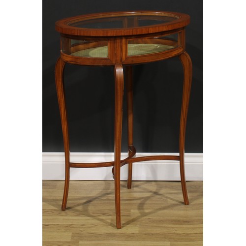 2559 - A Sheraton Revival satinwood bijouterie table, oval rosewood crossbanded hinged glazed top, slender ... 