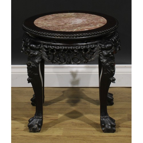 1775 - A Chinese hardwood fish bowl stand, circular top with beaded border and inset marble panel, shaped a... 