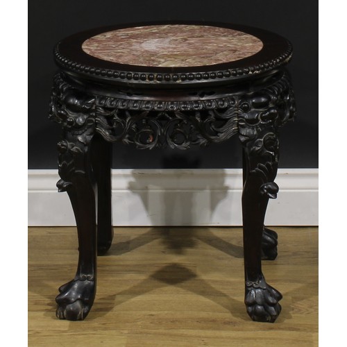 1775 - A Chinese hardwood fish bowl stand, circular top with beaded border and inset marble panel, shaped a... 