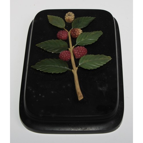 2548 - A Russian specimen hardstone desk weight, applied and inlaid with a branch of raspberries, waisted r... 