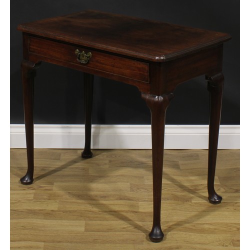 1733 - A George II mahogany side table, oversailing top with moulded edge above a long cockbeaded frieze dr... 