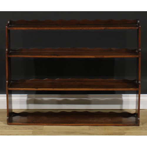 1708 - A 19th century mahogany wall hanging waterfall bookcase, 77cm high, 99cm wide, 21.5cm deep