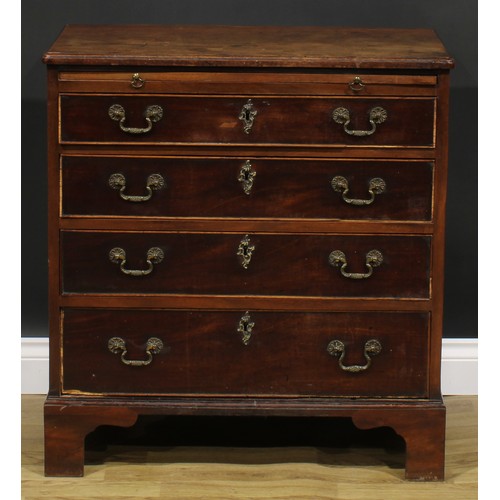 1732 - A George II mahogany bachelor's chest, slightly oversailing top above a slide and four long graduate... 