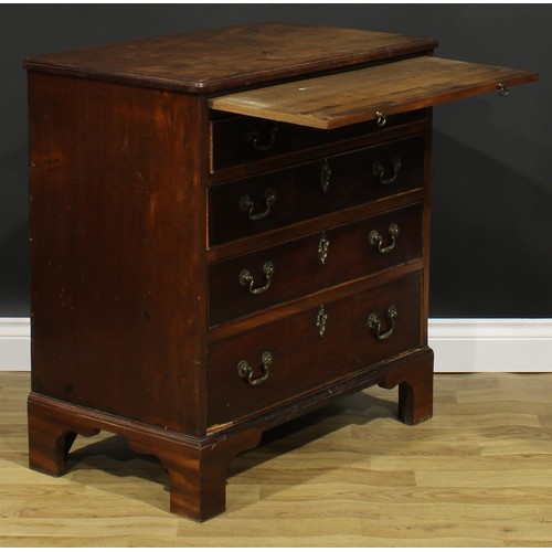 1732 - A George II mahogany bachelor's chest, slightly oversailing top above a slide and four long graduate... 