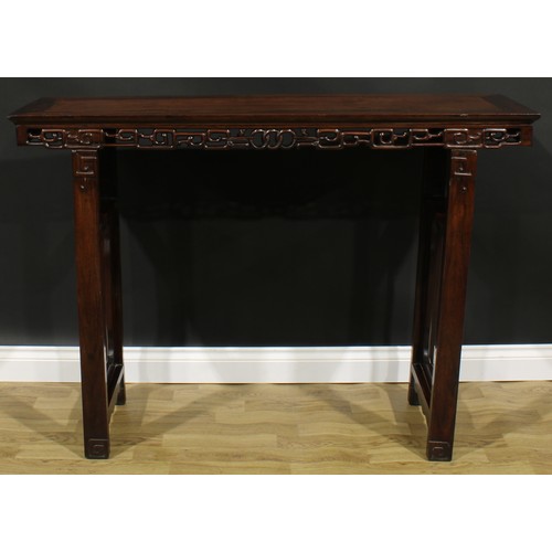 1648 - A Chinese hardwood altar table, rectangular top, shaped apron pierced and carved with stylised cloud... 