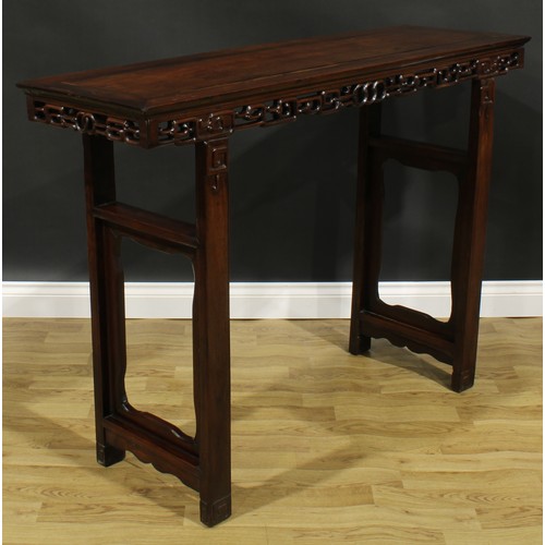 1648 - A Chinese hardwood altar table, rectangular top, shaped apron pierced and carved with stylised cloud... 