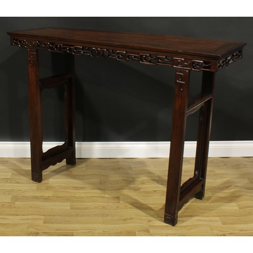 1648 - A Chinese hardwood altar table, rectangular top, shaped apron pierced and carved with stylised cloud... 