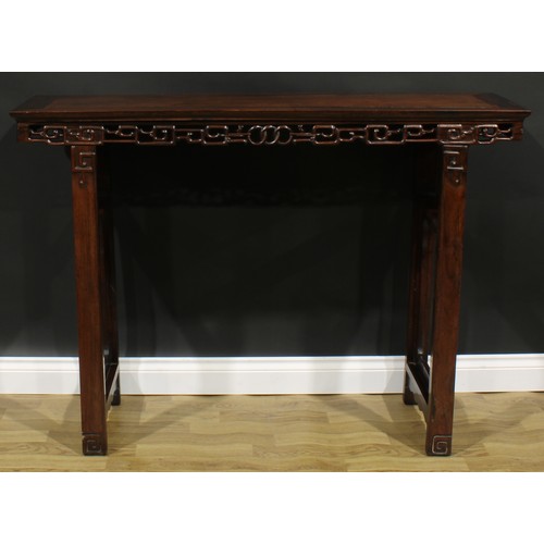 1648 - A Chinese hardwood altar table, rectangular top, shaped apron pierced and carved with stylised cloud... 