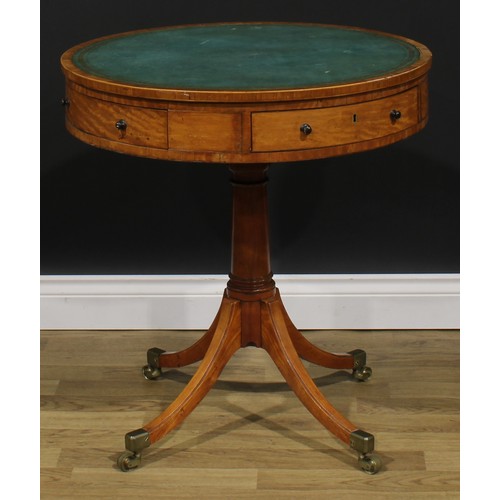 2177 - A Sheraton period satinwood drum table, tulipwood crossbanded top with inset tooled and gilt writing... 