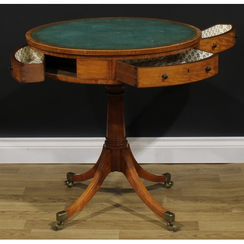 2177 - A Sheraton period satinwood drum table, tulipwood crossbanded top with inset tooled and gilt writing... 