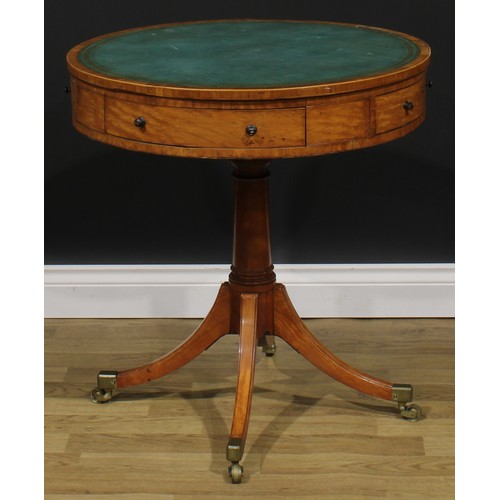 2177 - A Sheraton period satinwood drum table, tulipwood crossbanded top with inset tooled and gilt writing... 