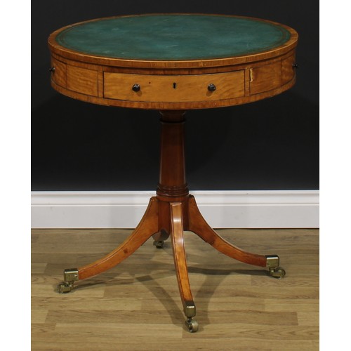 2177 - A Sheraton period satinwood drum table, tulipwood crossbanded top with inset tooled and gilt writing... 