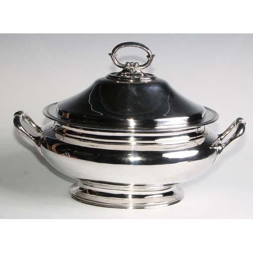 1109 - A Victorian silver two handled oval tureen and cover, domed cover, scroll handles, pedestal base, 40... 