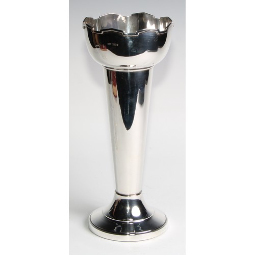 1070 - A silver trumpet shaped vase, castellated rim, spreading cylindrical base, 31cm high, James Dixon & ... 