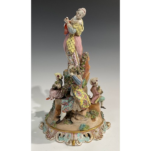 296 - A Meissen porcelain figure group, of a gentleman and his companion draped in a floral encrusted garl... 