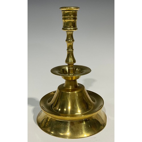 1812 - A pair of 19th century brass candlesticks, possibly Spanish, broad drip pan, trumpet shaped base, 20... 