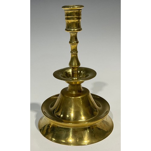 1812 - A pair of 19th century brass candlesticks, possibly Spanish, broad drip pan, trumpet shaped base, 20... 