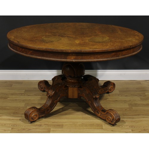 2594 - A Victorian pollard and plain sawn oak centre table, circular tilting top, turned column, shaped leg... 