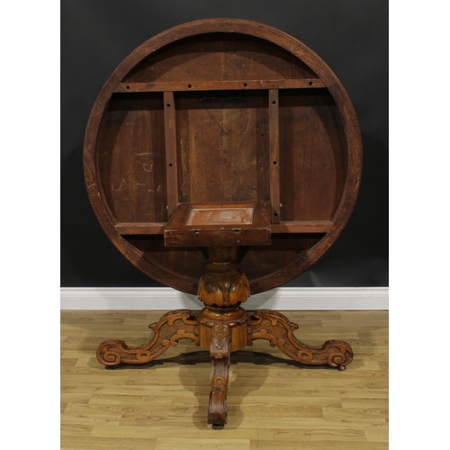 2594 - A Victorian pollard and plain sawn oak centre table, circular tilting top, turned column, shaped leg... 