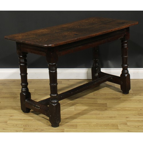 1566 - A 17th century and later joined oak table, of small proportions, rounded rectangular top, turned sup... 