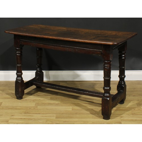 1566 - A 17th century and later joined oak table, of small proportions, rounded rectangular top, turned sup... 