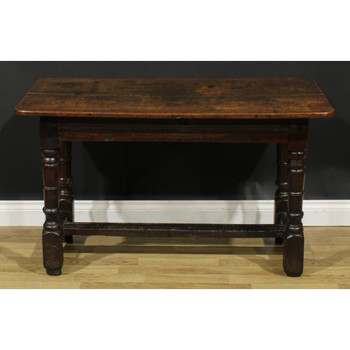 1566 - A 17th century and later joined oak table, of small proportions, rounded rectangular top, turned sup... 