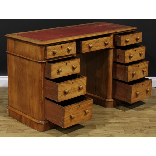 2603 - A Victorian satin birch desk, slightly oversailing top with inset tooled and gilt writing surface ab... 