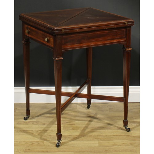 1890 - An Edwardian satinwood crossbanded mahogany envelope card table, hinged top enclosing a baize lined ... 