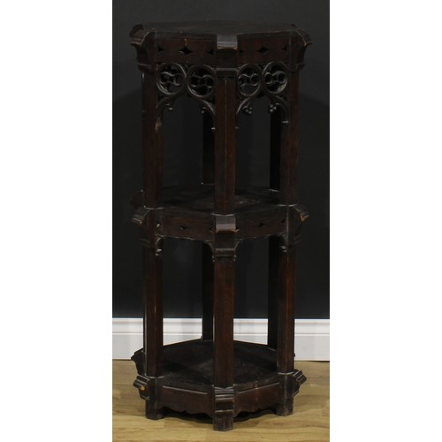 2148 - A Gothic Revival oak three-tier statuary pedestal, 100cm high, the upper plateau 39cm wide, early 20... 