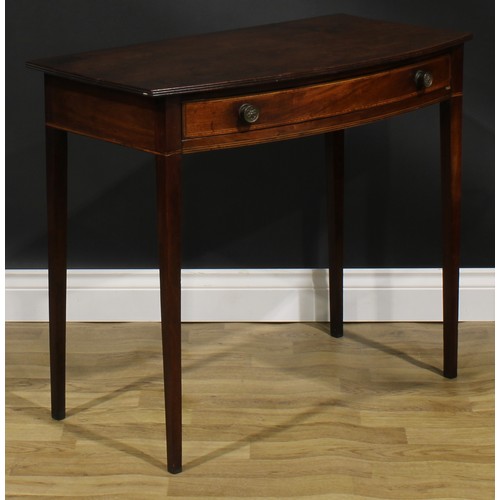 2118 - A George III mahogany bowfront side table, oversailing top with reeded edge above a long satinwood b... 