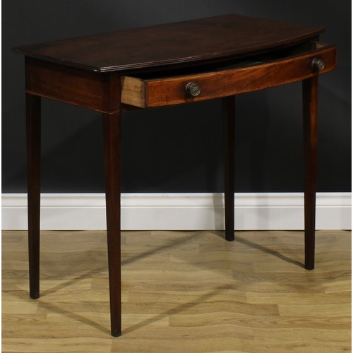 2118 - A George III mahogany bowfront side table, oversailing top with reeded edge above a long satinwood b... 