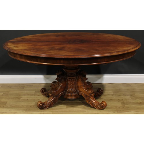 1627 - A 19th century mahogany extending dining table, oval top with moulded edge and one additional leaf, ... 