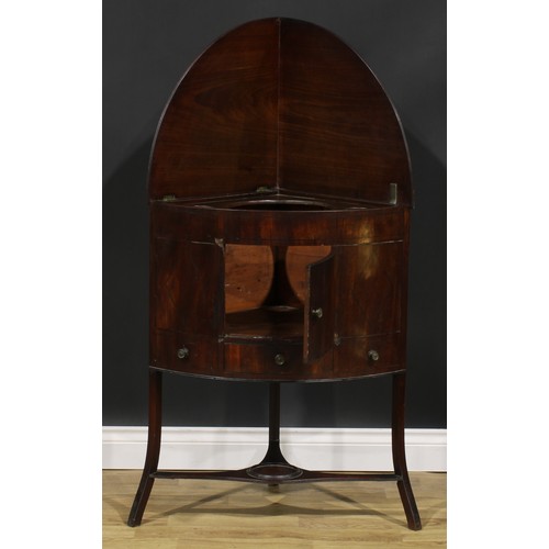 1794 - A George III mahogany corner washstand, hinged splashback, 82cm opening to 126.5cm high, 66cm wide, ... 