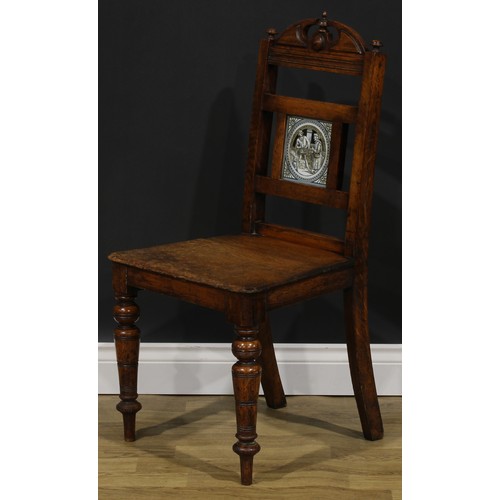 1973 - A pair of late Victorian tile back oak hall chairs, of Shakespearean interest, the Shakespeare serie... 