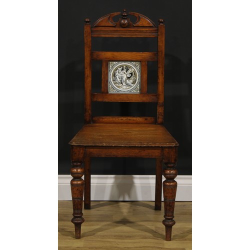 1973 - A pair of late Victorian tile back oak hall chairs, of Shakespearean interest, the Shakespeare serie... 