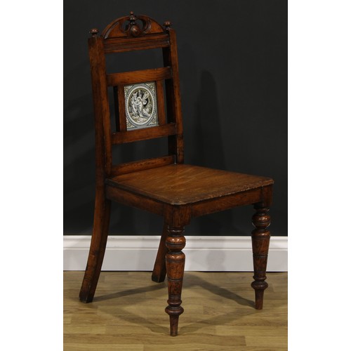 1973 - A pair of late Victorian tile back oak hall chairs, of Shakespearean interest, the Shakespeare serie... 