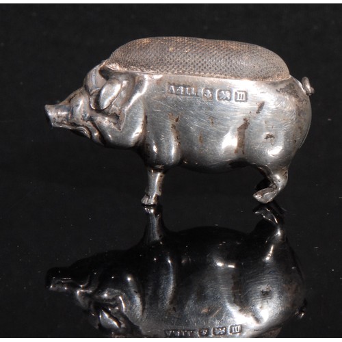 2241 - A George V silver novelty pincushion as a pig, 5cm wide, Adie & Lovekin Ltd, Birmingham 1911