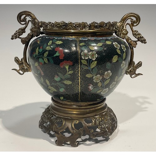 432 - A Japanese cloisonne ovoid jardinière, decorated with flowering stems on a moss green ground, brass ... 