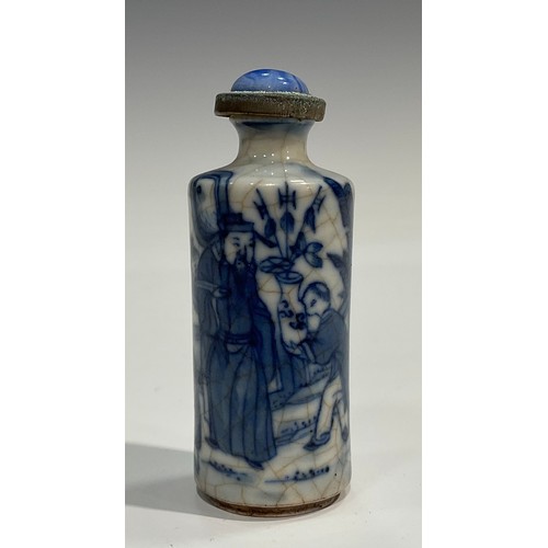 2235 - A Chinese porcelain cylindrical scent bottle, painted in tones of underglaze blue with elder and chi... 