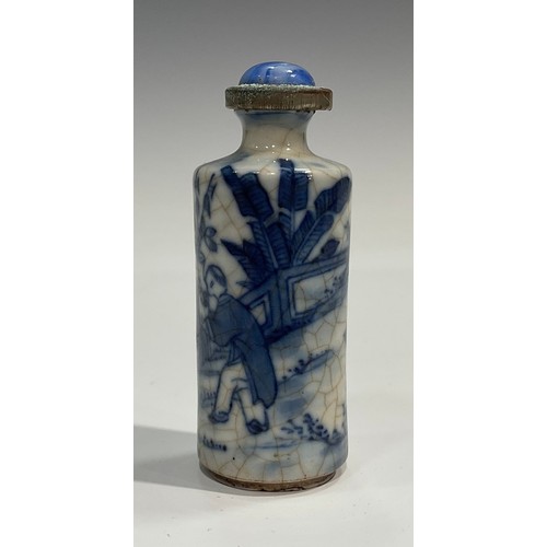 2235 - A Chinese porcelain cylindrical scent bottle, painted in tones of underglaze blue with elder and chi... 