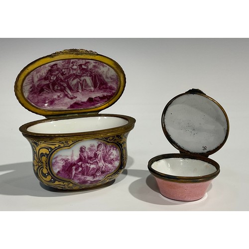 2236 - A French ovoid ceramic and gilt box, decorated with a scene of a lady and gentleman on a blue ground... 