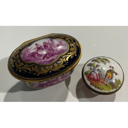 2236 - A French ovoid ceramic and gilt box, decorated with a scene of a lady and gentleman on a blue ground... 