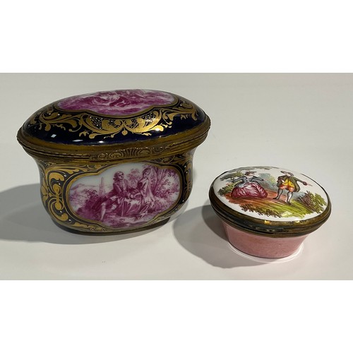 2236 - A French ovoid ceramic and gilt box, decorated with a scene of a lady and gentleman on a blue ground... 