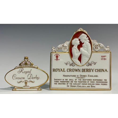 262 - A rare Royal Crown Derby porcelain advertising plaque, moulded in relief with a Galant and his compa... 